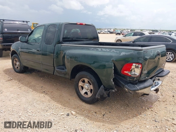 2001 Ford F-150 XL with VIN 1FTZX07271KB88709, listed as a IAAI auction lot 42599181 with 153,985 mi miles and . Bid and sale history available at DreamBid. Image 3.