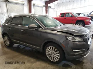 2019 Lincoln MKC Standard z VIN 5LMCJ1C97KUL26389, wystawiony jako Copart lot #70052054 z przebiegiem 36 756 mil mil oraz Szkody całkowita. Historia ofert i sprzedaży dostępna na DreamBid. Obrazek 4.