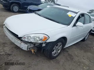 2014 Chevrolet Impala LS with VIN 2G1WA5E31E1163087, listed as a IAAI auction lot 41895666 with 138,348 mi miles and . Bid and sale history available at DreamBid. Image 2.
