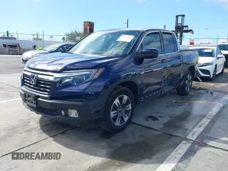 2017 Honda Ridgeline RTL-T with VIN 5FPYK2F68HB001759, listed as a IAAI auction lot 41562343 with 59,633 mi miles and . Bid and sale history available at DreamBid. Image 17.