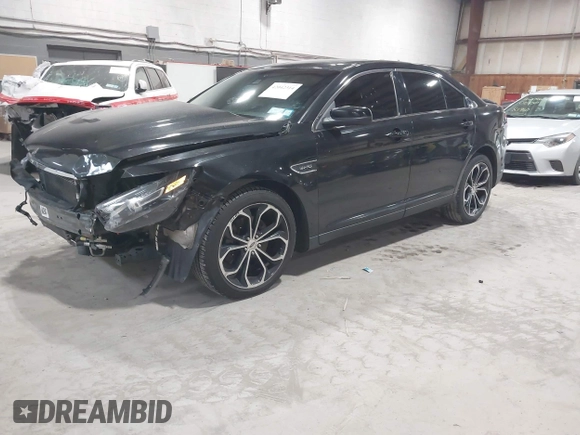 2015 Ford Taurus SHO with VIN 1FAHP2KT0FG132988, listed as a IAAI auction lot 42042314 with 192,974 mi miles and . Bid and sale history available at DreamBid. Image 2.