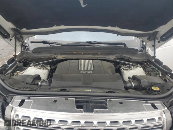 2014 Land Rover Range Rover HSE with VIN SALGS2WF9EA176815, listed as a Copart auction lot 58068405 with 155,260 mi miles and Salvage title. Bid and sale history available at DreamBid. Image 12.