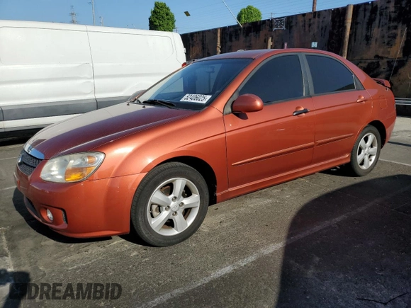2009 Kia Spectra EX with VIN KNAFE222995027376, listed as a Copart auction lot 52406025 with 73,692 mi miles and Salvage Title. Bid and sale history available at DreamBid. Image 1.