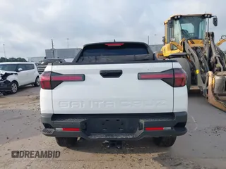 2022 Hyundai Santa Cruz SEL z VIN 5NTJBDAE5NH007005, wystawiony jako IAAI lot #42058065 z przebiegiem 30 825 mil mil oraz . Historia ofert i sprzedaży dostępna na DreamBid. Obrazek 17.