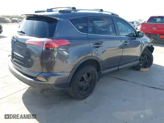 2018 Toyota RAV4 LE with VIN 2T3ZFREV4JW412661, listed as a IAAI auction lot 41781229 with 140,131 mi miles. Bid and sale history available at carsss.com. Image 4.
