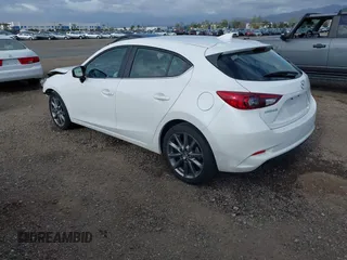 2018 Mazda 3 Touring with VIN 3MZBN1L31JM225108, listed as a IAAI auction lot 41959304 with 74,933 mi miles. Bid and sale history available at carsss.com. Image 3.