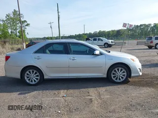 2012 Toyota Camry XLE z VIN 4T1BD1FK4CU017422, wystawiony jako IAAI lot #42366815 z przebiegiem 156 506 mil mil oraz . Historia ofert i sprzedaży dostępna na DreamBid. Obrazek 13.