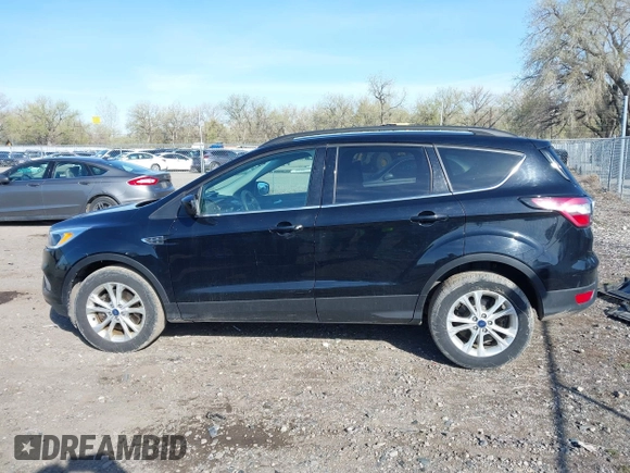 2018 Ford Escape SE z VIN 1FMCU9GD5JUB15259, wystawiony jako IAAI lot #42182040 z przebiegiem 122 194 mil mil oraz . Historia ofert i sprzedaży dostępna na DreamBid. Obrazek 15.