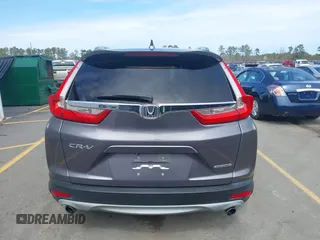 2018 Honda CR-V Touring with VIN 7FARW1H9XJE018575, listed as a IAAI auction lot 41747192 with 83,699 mi miles and . Bid and sale history available at carsss.com. Image 16.