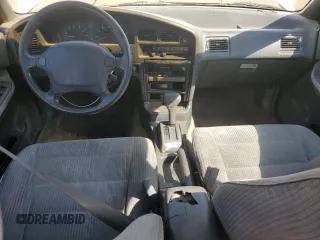 1994 Subaru Legacy L with VIN 4S3BJ6337R7955431, listed as a Copart auction lot 70200794 with 281,694 mi miles and Salvage Title. Bid and sale history available at DreamBid. Image 8.