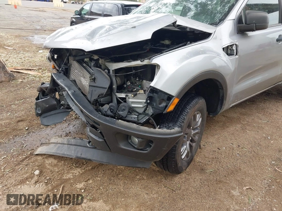 2020 Ford Ranger XL z VIN 1FTER1EH4LLA77179, wystawiony jako IAAI lot #42602270 z przebiegiem 54 999 mil mil oraz . Historia ofert i sprzedaży dostępna na DreamBid. Obrazek 6.