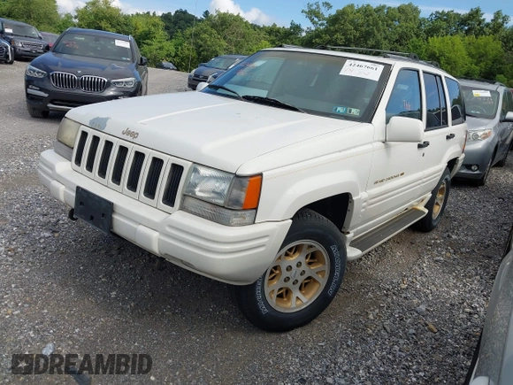 1996 Jeep Grand Cherokee Limited with VIN 1J4GZ78Y1TC381474, listed as a IAAI auction lot 42467661 with 155,587 mi miles and . Bid and sale history available at DreamBid. Image 2.