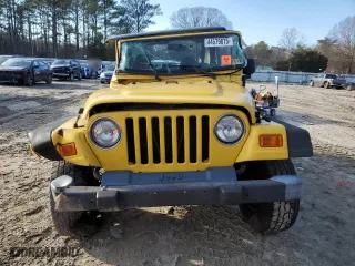 2001 Jeep Wrangler Sport with VIN 1J4FA49S21P312522, listed as a Copart auction lot 54698935 with 201,199 mi miles and Salvage Title. Bid and sale history available at carsss.com. Image 5.