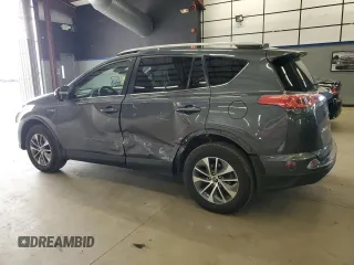 2016 Toyota RAV4 Hybrid XLE with VIN JTMRJREV0GD035203, listed as a Copart auction lot 54300225 with 153,369 mi miles and Salvage Title. Bid and sale history available at carsss.com. Image 2.
