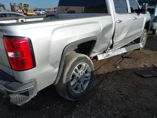 2015 GMC Sierra 2500HD available WiFi SLT with VIN 1GT12ZEG7FF167096, listed as a IAAI auction lot 41408317 with 152,969 mi miles. Bid and sale history available at carsss.com. Image 6.