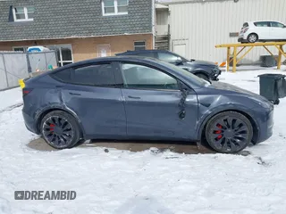 2023 Tesla Model Y Performance with VIN 7SAYGDEF0PF898181, listed as a IAAI auction lot 41577666 with 19,051 mi miles and . Bid and sale history available at DreamBid. Image 13.