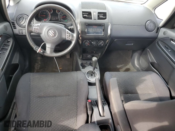 2013 Suzuki SX4 with VIN JS2YB5A42D6100038, listed as a Copart auction lot 73148344 with 141,675 mi miles and Salvage Title. Bid and sale history available at DreamBid. Image 8.