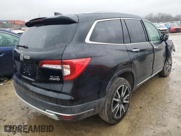 2021 Honda Pilot Elite with VIN 5FNYF6H02MB036207, listed as a Copart auction lot 85271354 with 63,295 mi miles and Salvage Title. Bid and sale history available at DreamBid. Image 3.
