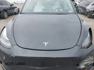 2024 Tesla Model Y Long Range z VIN 7SAYGDEEXRA226636, wystawiony jako IAAI lot #41622144 z przebiegiem 8 908 mil mil oraz . Historia ofert i sprzedaży dostępna na DreamBid. Obrazek 10.