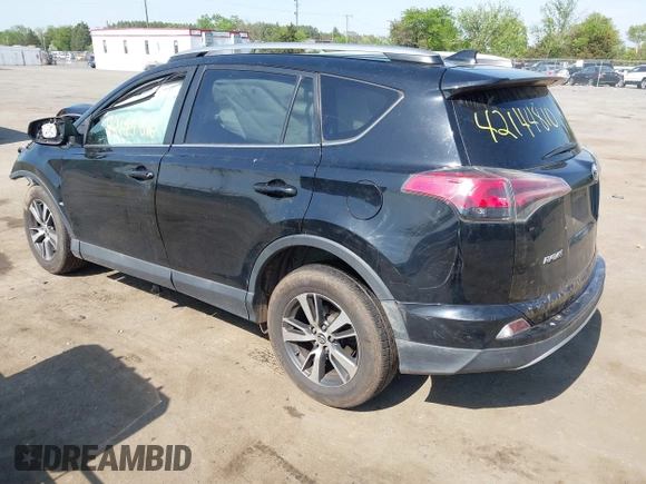 2018 Toyota RAV4 XLE with VIN 2T3WFREVXJW484872, listed as a IAAI auction lot 42144810 with Not provided miles and . Bid and sale history available at DreamBid. Image 3.