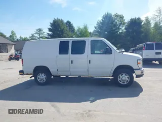 2014 Ford Econoline Cargo Commercial with VIN 1FTNE2EW2EDA18970, listed as a IAAI auction lot 42375174 with 174,022 mi miles and . Bid and sale history available at DreamBid. Image 13.