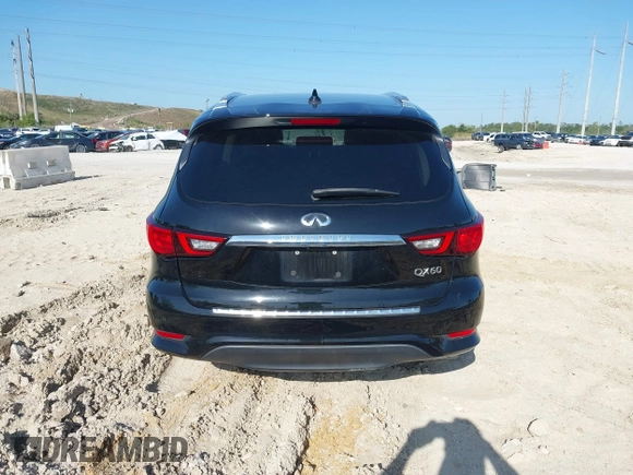 2020 Infiniti QX60 Pure with VIN 5N1DL0MN4LC539573, listed as a IAAI auction lot 42010032 with 104,507 mi miles and . Bid and sale history available at DreamBid. Image 16.
