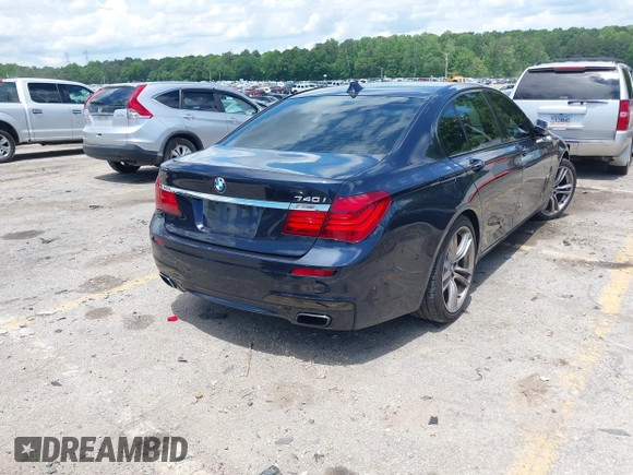 2015 BMW 7 Series 740i with VIN WBAYA6C59FD826726, listed as a IAAI auction lot 42254240 with 110,006 mi miles and . Bid and sale history available at DreamBid. Image 4.