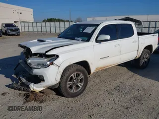 2018 Toyota Tacoma SR5 with VIN 3TMAZ5CN4JM062272, listed as a IAAI auction lot 41671472 with 114,566 mi miles and . Bid and sale history available at DreamBid. Image 18.