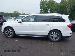 2014 Mercedes-Benz GL 450 with VIN 4JGDF7CE5EA408944, listed as a IAAI auction lot 42397384 with 182,106 mi miles and . Bid and sale history available at DreamBid. Image 14.