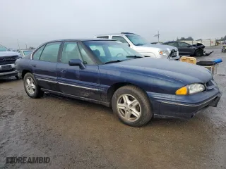 1998 Pontiac Bonneville SE with VIN 1G2HX52K7W4222082, listed as a Copart auction lot 84293574 with 201,575 mi miles and Salvage Title. Bid and sale history available at carsss.com. Image 4.
