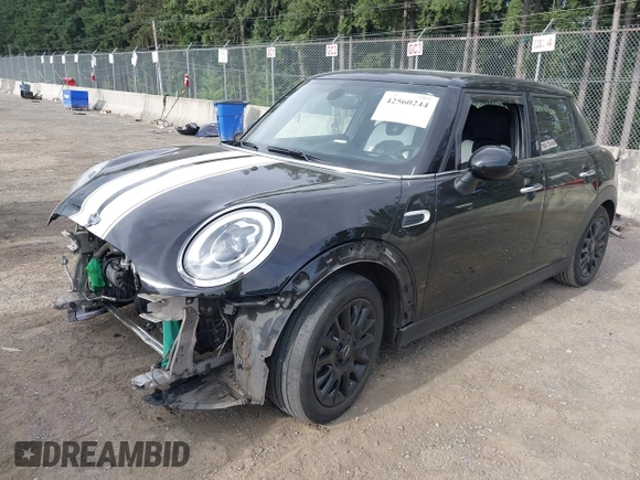 2015 MINI Hardtop 4 Door with VIN WMWXS5C58FT833420, listed as a IAAI auction lot 42560244 with 115,446 mi miles and . Bid and sale history available at DreamBid. Image 2.