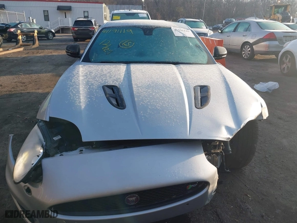 2014 Jaguar XK with VIN SAJWA4DC7EMB52199, listed as a IAAI auction lot 41191119 with 90,585 mi miles. Bid and sale history available at carsss.com. Image 12.
