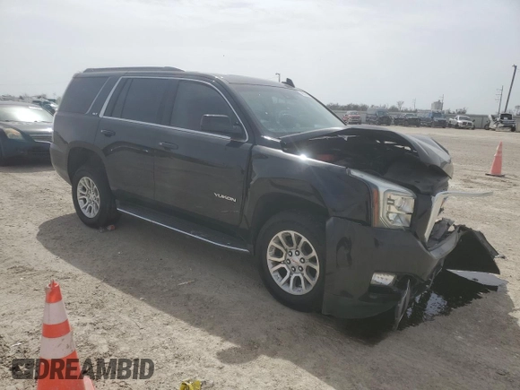 2019 GMC Yukon SLT with VIN 1GKS2BKC5KR166412, listed as a Copart auction lot 48030905 with 125,774 mi miles and Salvage Title. Bid and sale history available at DreamBid. Image 4.