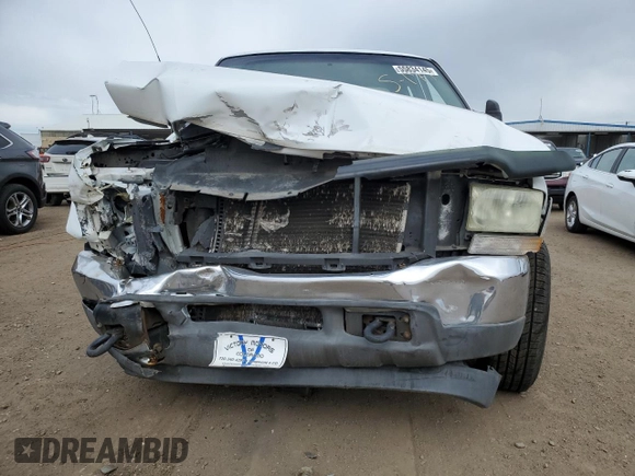 2002 Ford F-250 XL with VIN 1FTNX20F02EB92592, listed as a Copart auction lot 55834145 with 299,524 mi miles and Salvage title. Bid and sale history available at DreamBid. Image 5.