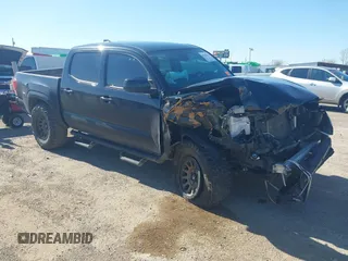 2022 Toyota Tacoma SR with VIN 3TMCZ5ANXNM523301, listed as a IAAI auction lot 41762874 with 45,017 mi miles and . Bid and sale history available at DreamBid. Image 1.