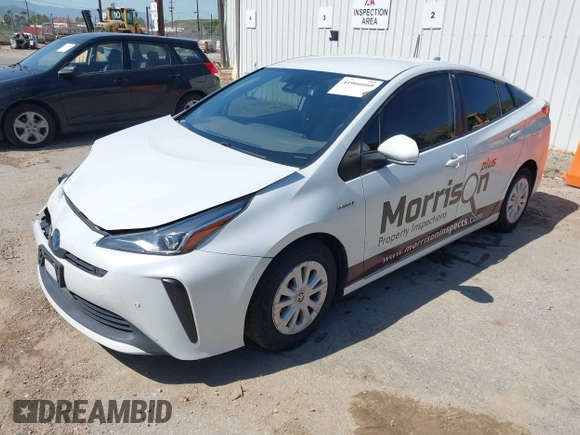 2021 Toyota Prius L Eco with VIN JTDKAMFU8M3133925, listed as a IAAI auction lot 41966660 with 115,193 mi miles. Bid and sale history available at carsss.com. Image 19.