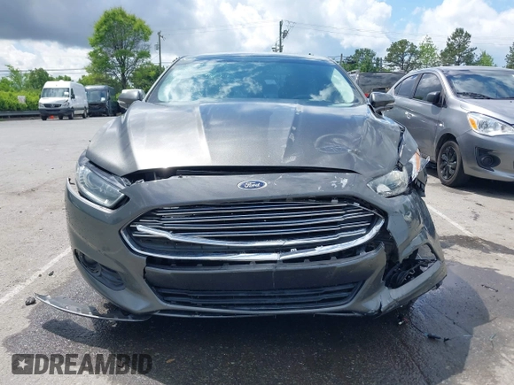 2016 Ford Fusion SE Hybrid с VIN 3FA6P0LU6GR127095, выставлен на аукционе IAAI как лот 42013324 с пробегом 134 474 миль миль и . История ставок и продаж доступна на DreamBid. Изображение 12.