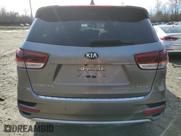 2018 Kia Sorento SX Limited z VIN 5XYPKDA57JG377866, wystawiony jako Copart lot #84375944 z przebiegiem Nie podano mil oraz Szkoda całkowita • Salvage title. Historia ofert i sprzedaży dostępna na DreamBid. Obrazek 6.