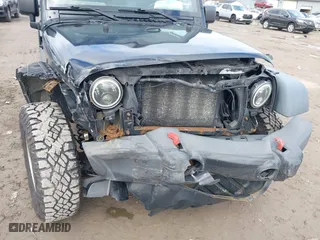 2011 Jeep Wrangler Sport with VIN 1J4AA2D1XBL634783, listed as a IAAI auction lot 41928702 with 154,379 mi miles. Bid and sale history available at carsss.com. Image 6.