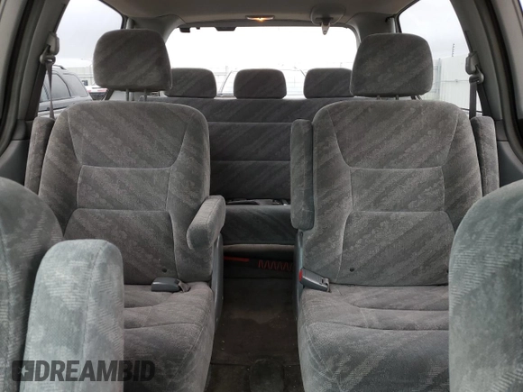 2003 Honda Odyssey EX with VIN 2HKRL18603H008412, listed as a Copart auction lot 87502365 with 352,773 mi miles and Salvage Title. Bid and sale history available at DreamBid. Image 10.
