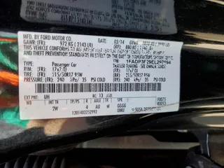 2014 Ford Focus SE with VIN 1FADP3F29EL297594, listed as a Copart auction lot 53249755 with 207,713 mi miles and Salvage Title. Bid and sale history available at carsss.com. Image 12.