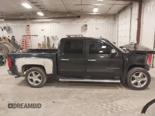 2012 Chevrolet Silverado 1500 LT with VIN 3GCPKSE77CG259983, listed as a IAAI auction lot 41934129 with 295,452 mi miles and . Bid and sale history available at DreamBid. Image 13.