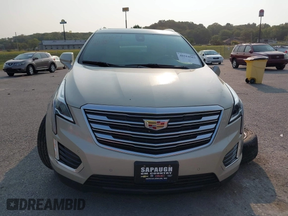 2017 Cadillac XT5 Premium Luxury FWD z VIN 1GYKNCRSXHZ164468, wystawiony jako IAAI lot #40314503 z przebiegiem 94 008 mil mil oraz . Historia ofert i sprzedaży dostępna na DreamBid. Obrazek 12.