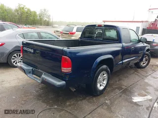 2002 Dodge Dakota Sport with VIN 1B7GL32X12S561414, listed as a IAAI auction lot 42060300 with 235,957 mi miles. Bid and sale history available at carsss.com. Image 4.