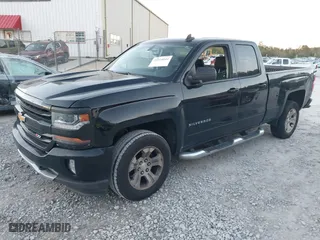2018 Chevrolet Silverado 1500 LT with VIN 1GCVKREH9JZ115468, listed as a IAAI auction lot 40924644 with 213,059 mi miles. Bid and sale history available at carsss.com. Image 2.