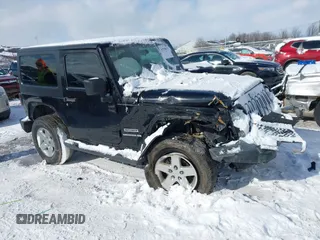 2014 Jeep Wrangler Sport with VIN 1C4AJWAG5EL285994, listed as a IAAI auction lot 41558673 with 98,779 mi miles and . Bid and sale history available at DreamBid. Image 12.