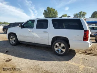 2009 Chevrolet Suburban LT w/2LT with VIN 1GNFC26J89R301726, listed as a Copart auction lot 73559004 with 188,380 mi miles and Salvage Title. Bid and sale history available at carsss.com. Image 2.
