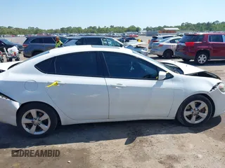 2015 Dodge Dart SXT with VIN 1C3CDFBB0FD121068, listed as a IAAI auction lot 41989686 with 154,205 mi miles and . Bid and sale history available at DreamBid. Image 13.