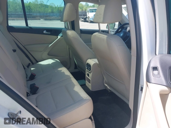 2013 Volkswagen Tiguan SE with VIN WVGAV7AX4DW528410, listed as a IAAI auction lot 42142132 with 148,511 mi miles and . Bid and sale history available at DreamBid. Image 8.