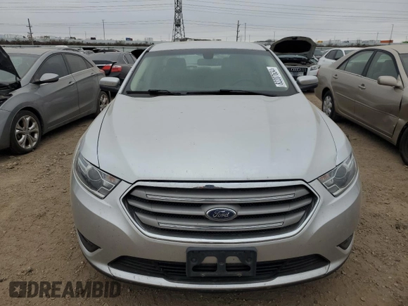 2016 Ford Taurus SEL with VIN 1FAHP2E9XGG144955, listed as a Copart auction lot 82207634 with 128,823 mi miles and Salvage Title. Bid and sale history available at DreamBid. Image 5.